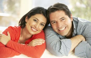 Smiling Couple With Dental Implants